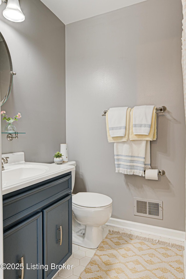1014 Old Mill Stream Ln, Shepherdsville, KY 40165 - half bathroom with vanity, tile patterned flooring, and toilet