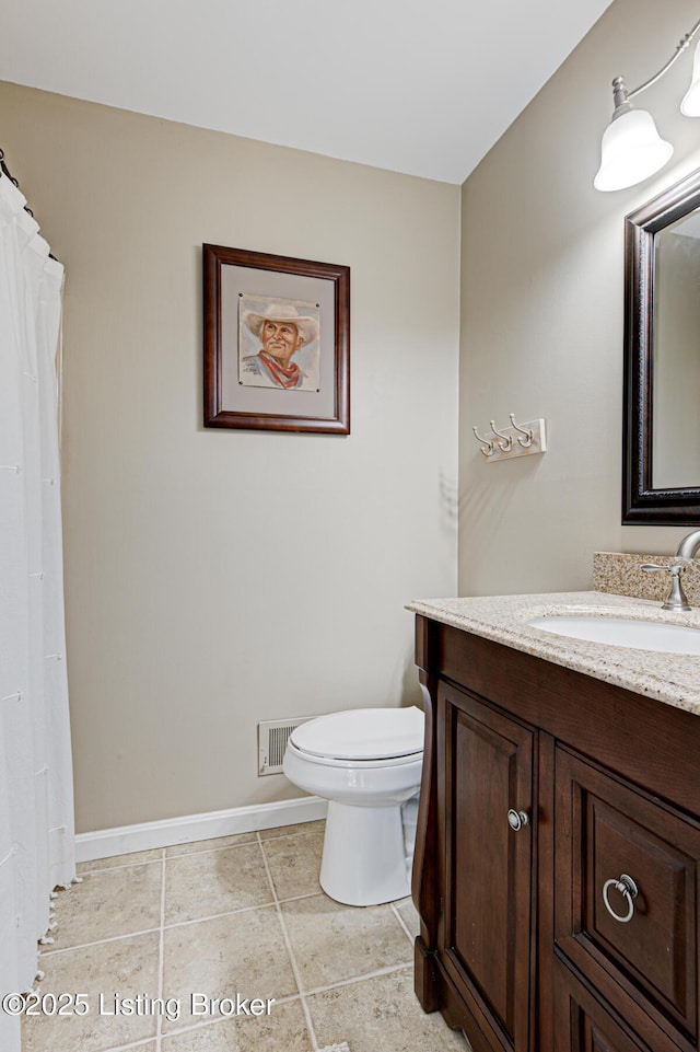 1014 Old Mill Stream Ln, Shepherdsville, KY 40165 - full bath with vanity, toilet, baseboards, and tile patterned flooring