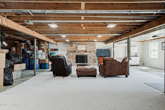 1014 Old Mill Stream Ln, Shepherdsville, KY 40165 - carpeted living area featuring a brick fireplace