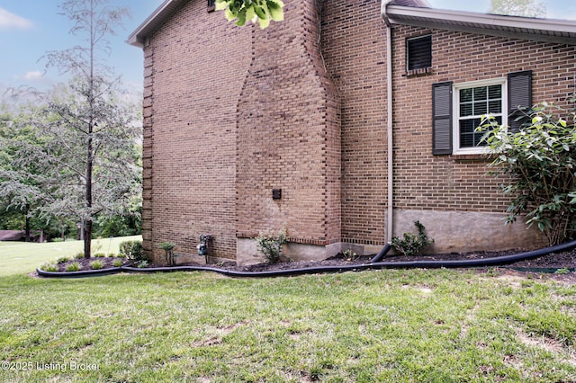 1014 Old Mill Stream Ln, Shepherdsville, KY 40165 - view of side of home featuring a lawn and brick siding