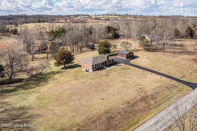 birds eye view of property featuring a rural view