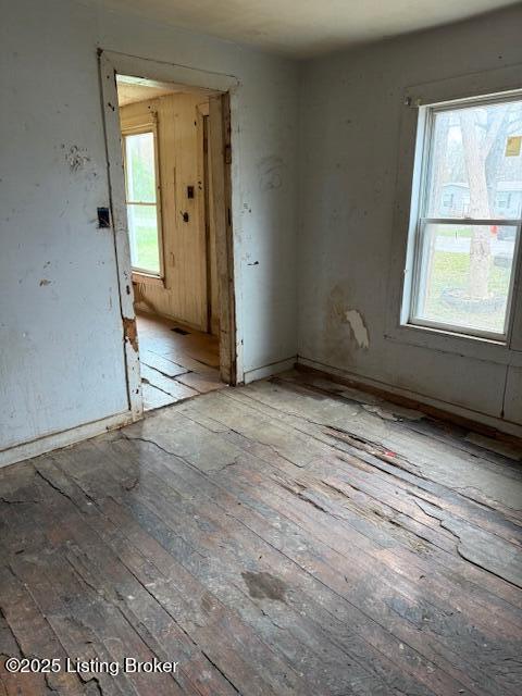 spare room featuring hardwood / wood-style flooring