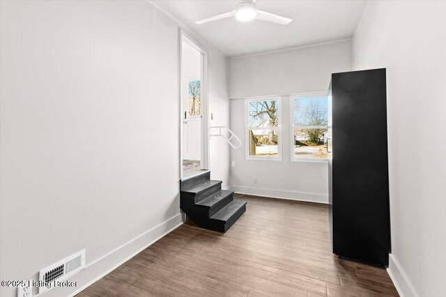 706 W Whitney Ave, Louisville, KY 40215 - empty room featuring baseboards, visible vents, wood finished floors, and a ceiling fan