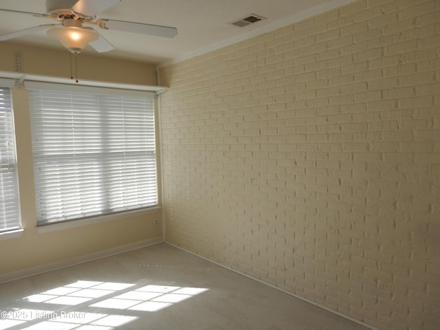 113 Lanai Dr Unit A, Shepherdsville, KY 40165 - empty room with crown molding, brick wall, ceiling fan, and visible vents