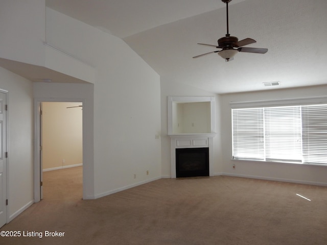 113 Lanai Dr Unit A, Shepherdsville, KY 40165 - unfurnished living room featuring vaulted ceiling, light carpet, a fireplace, visible vents, and ceiling fan
