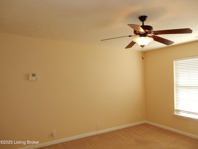 113 Lanai Dr Unit A, Shepherdsville, KY 40165 - unfurnished room with baseboards, a textured ceiling, ceiling fan, and light colored carpet