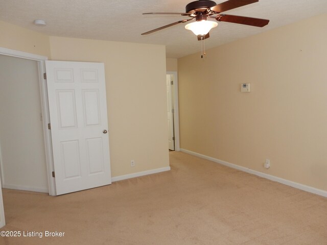 113 Lanai Dr Unit A, Shepherdsville, KY 40165 - interior space featuring a ceiling fan, light carpet, baseboards, and a textured ceiling