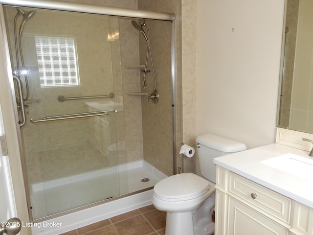 113 Lanai Dr Unit A, Shepherdsville, KY 40165 - bathroom with toilet, a stall shower, tile patterned flooring, and vanity