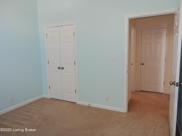 113 Lanai Dr Unit A, Shepherdsville, KY 40165 - unfurnished bedroom featuring light colored carpet, a closet, and baseboards