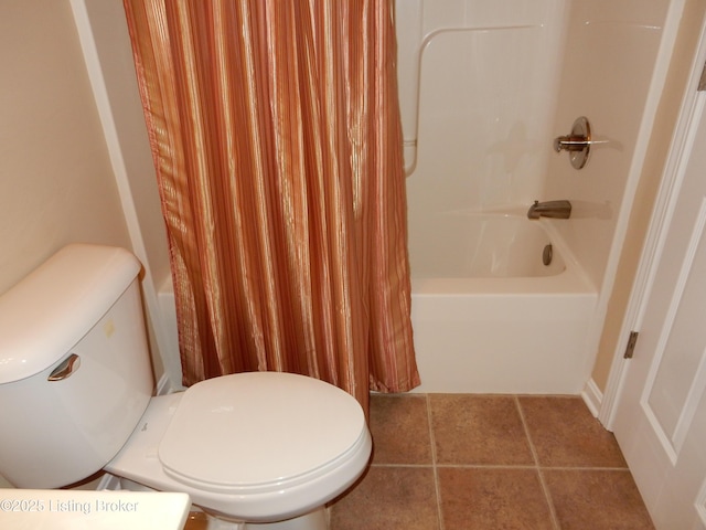 113 Lanai Dr Unit A, Shepherdsville, KY 40165 - bathroom featuring toilet, shower / bathtub combination with curtain, and tile patterned flooring