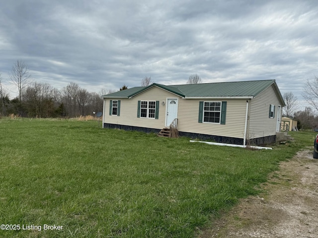 42 Foggy Bottom Ln, Garfield, KY 40140 - manufactured / mobile home featuring metal roof, a front yard, and entry steps