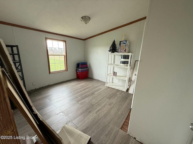 42 Foggy Bottom Ln, Garfield, KY 40140 - unfurnished room featuring wood finished floors and ornamental molding