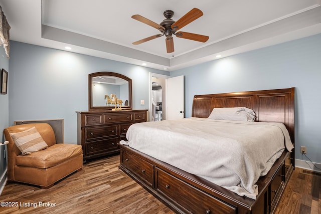 4613 S 2nd St, Louisville, KY 40214 - bedroom featuring a ceiling fan, wood finished floors, recessed lighting, and a raised ceiling