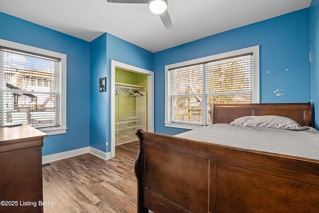 4613 S 2nd St, Louisville, KY 40214 - bedroom with visible vents, baseboards, ceiling fan, and wood finished floors