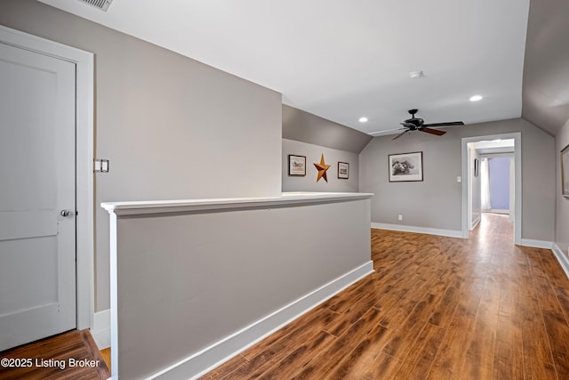 4613 S 2nd St, Louisville, KY 40214 - hallway with an upstairs landing, wood finished floors, lofted ceiling, baseboards, and recessed lighting