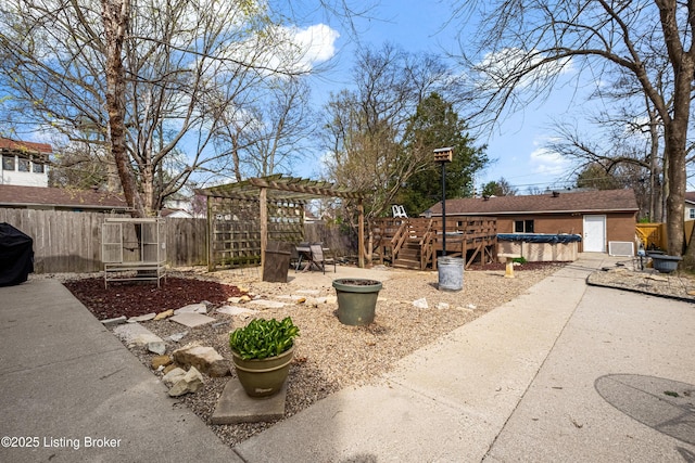 4613 S 2nd St, Louisville, KY 40214 - view of yard with a patio, a fenced backyard, a deck, and a pergola
