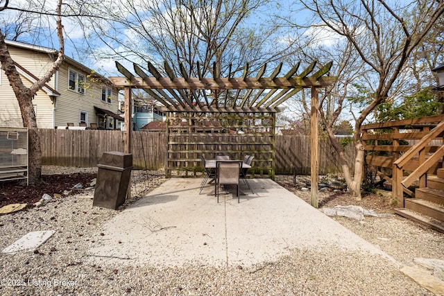 4613 S 2nd St, Louisville, KY 40214 - view of yard featuring a fenced backyard, central AC unit, outdoor dining area, a pergola, and a patio area