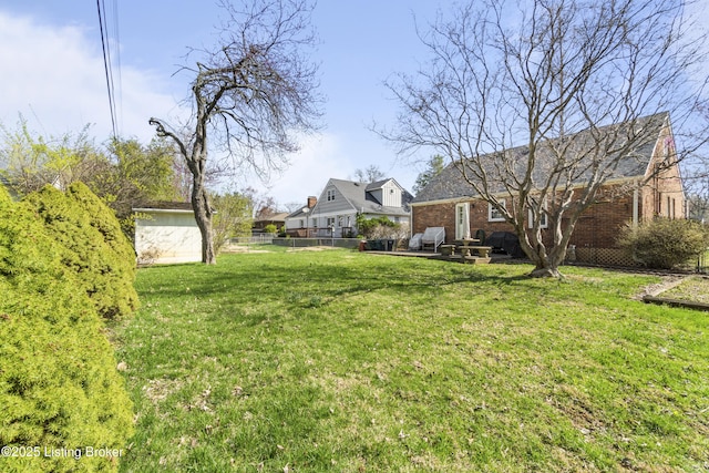 view of yard featuring fence
