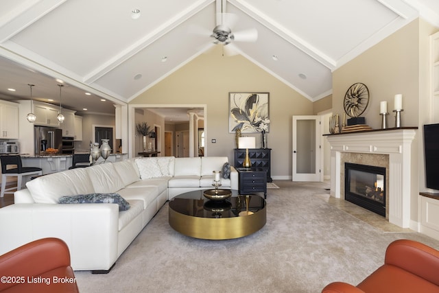 12206 Bridgeway Ct, Sellersburg, IN 47172 - living area with high vaulted ceiling, a premium fireplace, a ceiling fan, beam ceiling, and light carpet