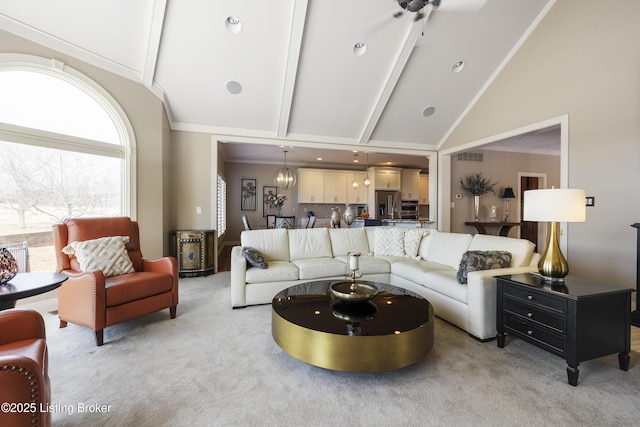12206 Bridgeway Ct, Sellersburg, IN 47172 - living area featuring high vaulted ceiling, beam ceiling, light colored carpet, ceiling fan, and ornamental molding