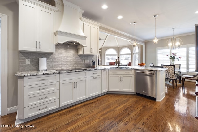 12206 Bridgeway Ct, Sellersburg, IN 47172 - kitchen with a peninsula, stainless steel dishwasher, premium range hood, white cabinets, and ornamental molding