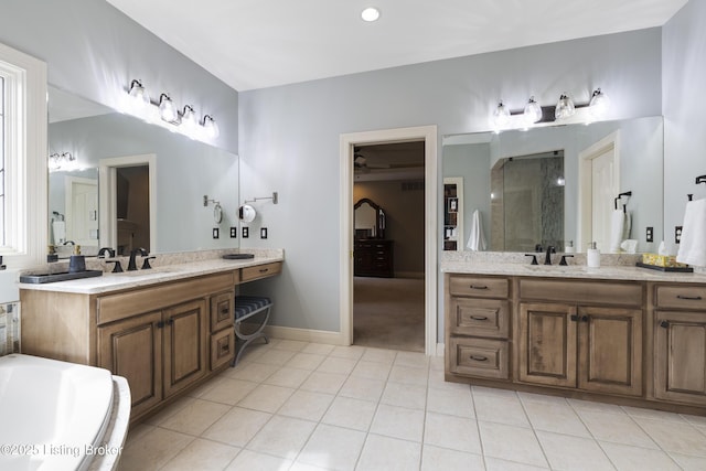 12206 Bridgeway Ct, Sellersburg, IN 47172 - bathroom featuring a sink, tile patterned floors, two vanities, and a stall shower