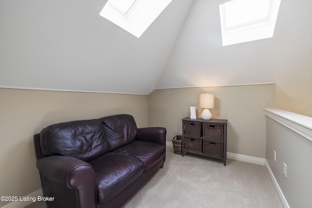 12206 Bridgeway Ct, Sellersburg, IN 47172 - living area featuring lofted ceiling with skylight, light carpet, and baseboards