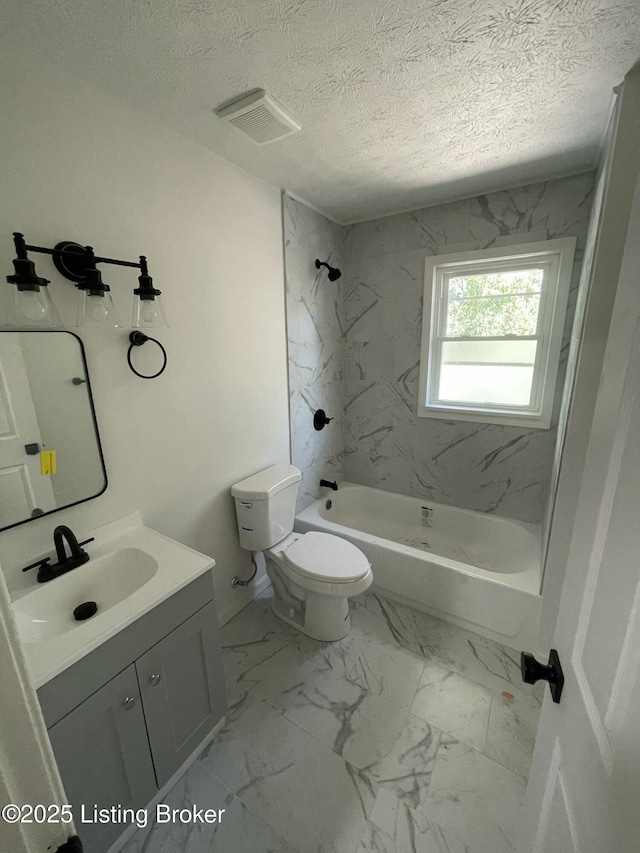 5001 Wabash Pl, Louisville, KY 40214 - full bathroom featuring toilet, vanity, shower / bathing tub combination, marble finish floor, and visible vents