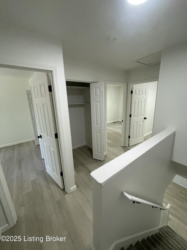 5001 Wabash Pl, Louisville, KY 40214 - hallway featuring baseboards and light wood-style floors