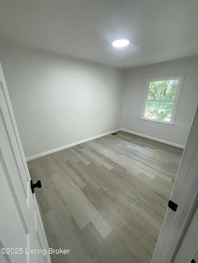 5001 Wabash Pl, Louisville, KY 40214 - empty room with baseboards and wood finished floors