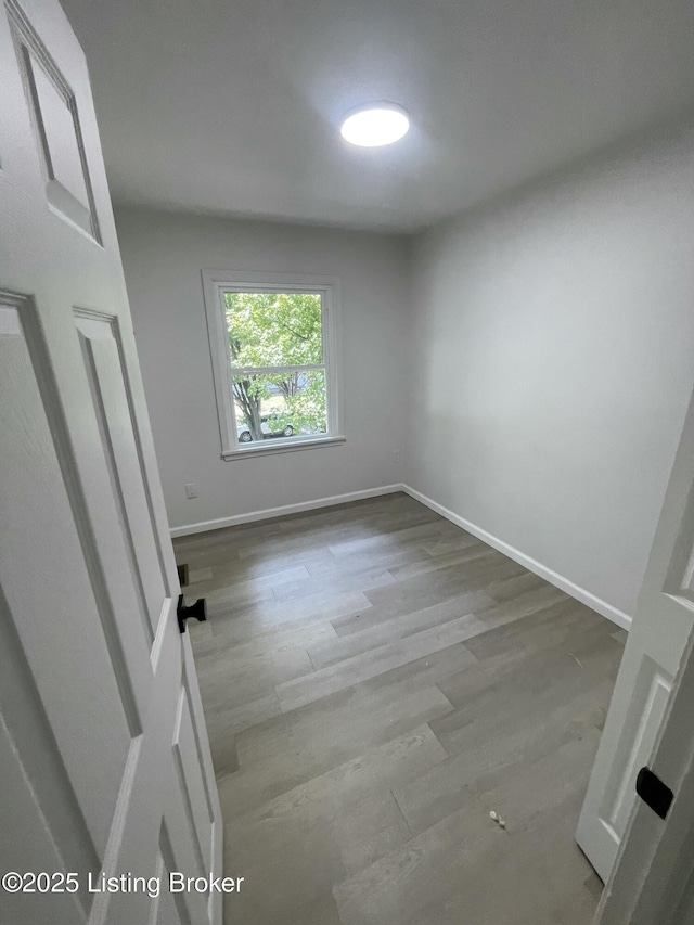 5001 Wabash Pl, Louisville, KY 40214 - unfurnished room featuring baseboards and wood finished floors
