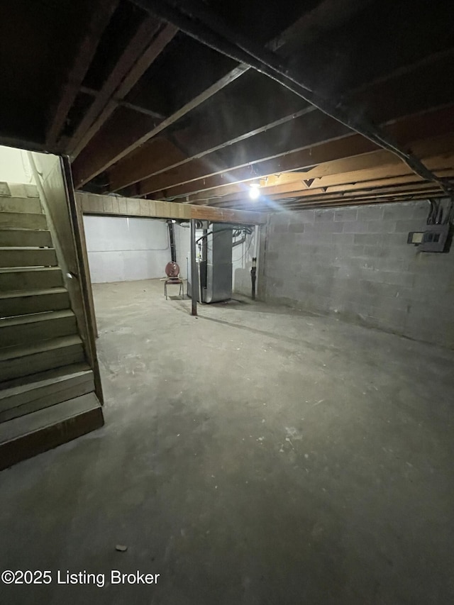 5001 Wabash Pl, Louisville, KY 40214 - unfinished below grade area featuring heating unit and stairs