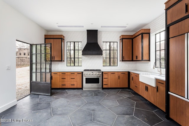 1801 Sulgrave Rd, Louisville, KY 40205 - kitchen with custom range hood, light countertops, a sink, and stainless steel stove