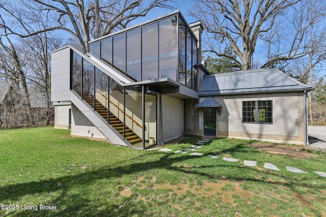 1801 Sulgrave Rd, Louisville, KY 40205 - view of front facade with stucco siding, stairway, and a front lawn