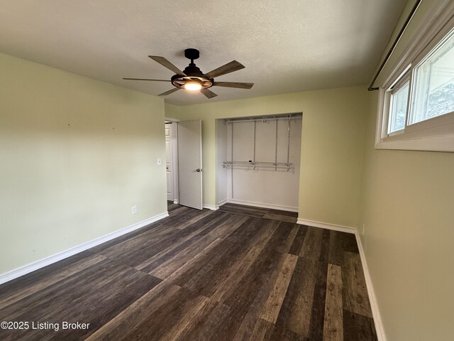 386 Pine Ridge Dr, Brandenburg, KY 40108 - unfurnished bedroom with baseboards, a ceiling fan, wood finished floors, and a textured ceiling