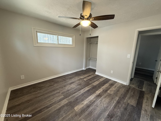 386 Pine Ridge Dr, Brandenburg, KY 40108 - unfurnished bedroom with baseboards, a textured ceiling, a closet, and dark wood finished floors