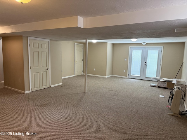 386 Pine Ridge Dr, Brandenburg, KY 40108 - basement with baseboards, carpet floors, a textured ceiling, and french doors