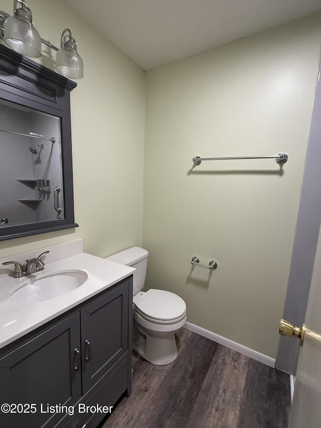 386 Pine Ridge Dr, Brandenburg, KY 40108 - full bath with a shower, vanity, toilet, baseboards, and wood finished floors