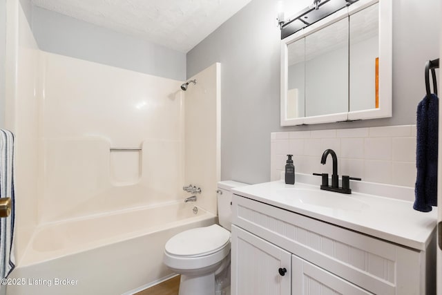 6515 Upper Hunters Trce, Louisville, KY 40216 - bathroom featuring vanity, bathing tub / shower combination, backsplash, and toilet