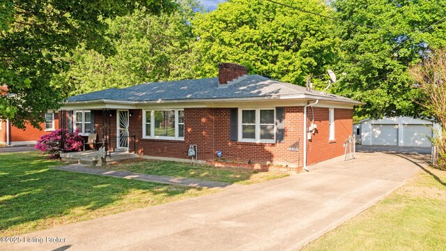 6515 Upper Hunters Trce, Louisville, KY 40216 - view of front of property featuring brick siding, a garage, a front yard, an outbuilding, and a chimney