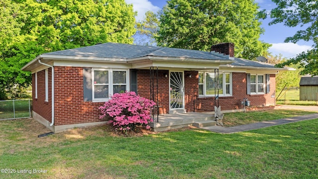 6515 Upper Hunters Trce, Louisville, KY 40216 - view of front of property with brick siding, fence, a chimney, and a front lawn
