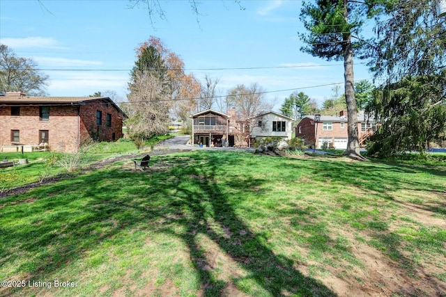 7812 Crown Top Rd, Louisville, KY 40241 - view of grassy yard featuring a wooden deck