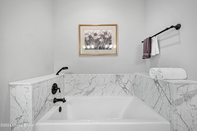 full bathroom with a bath