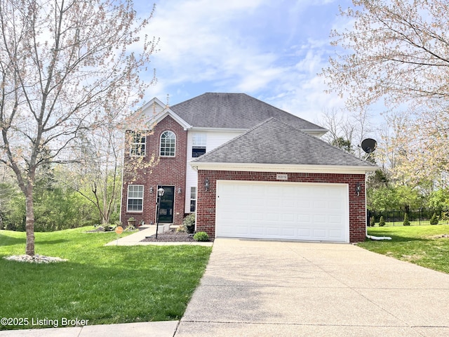 traditional home featuring a garage, driveway, a front yard, and roof with shingles