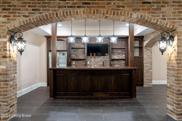 10900 Meeting St, Prospect, KY 40059 - bar with wet bar, ornamental molding, baseboards, and brick wall