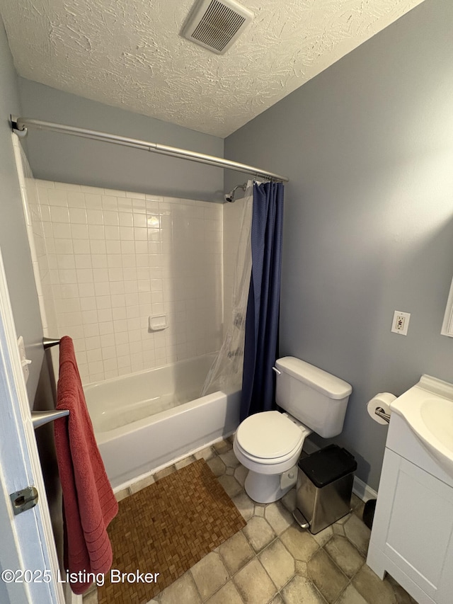 full bathroom featuring vanity, shower / bath combination with curtain, a textured ceiling, toilet, and visible vents