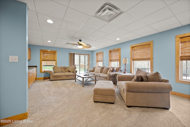 105 Moutardier Woods Way, Leitchfield, KY 42754 - living room with baseboards, light colored carpet, ceiling fan, and plenty of natural light