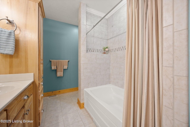 105 Moutardier Woods Way, Leitchfield, KY 42754 - full bath featuring tile patterned flooring, vanity, shower / tub combo with curtain, baseboards, and visible vents