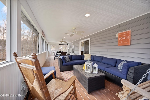 105 Moutardier Woods Way, Leitchfield, KY 42754 - sunroom with an outdoor living space, ceiling fan, a wooden deck, and wood finished floors