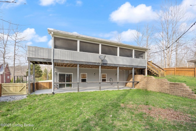 105 Moutardier Woods Way, Leitchfield, KY 42754 - rear view of property with a lawn, a sunroom, fence, and a patio